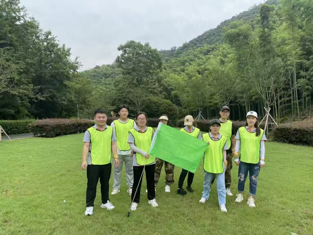 DryIceSys employees together at an outdoor team-building event